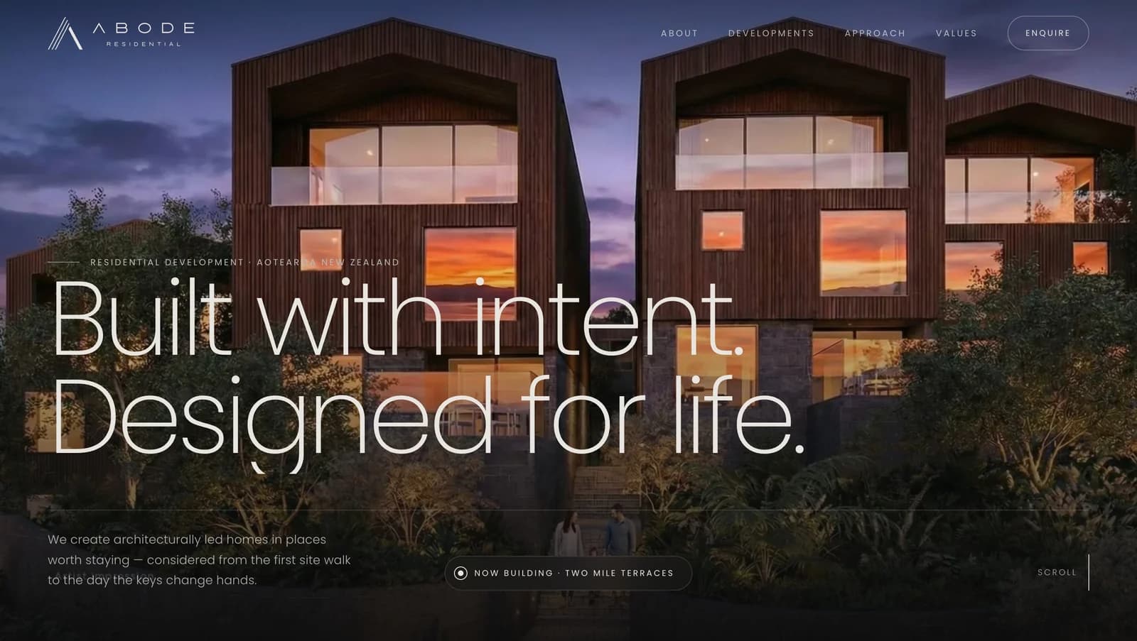 The Abode Residential homepage: 'Built with intent. Designed for life.' over an evening render of timber-clad terraced homes
